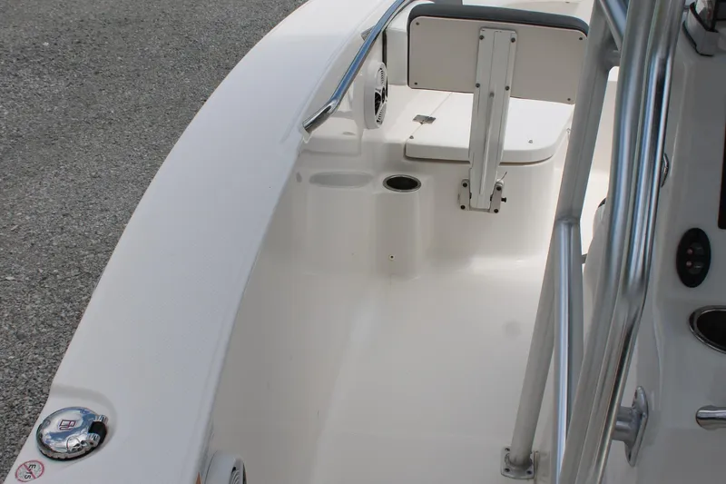 Slide: The Image of 2018 Robalo R200 Center Console boat interior with seating and storage. - 25