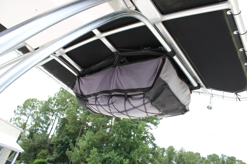 Slide: The Image of 2018 Robalo R200 Center Console boat with overhead storage bag. - 32