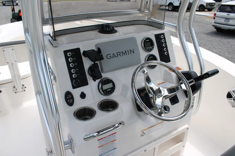 Slide: The Image of 2018 Robalo R200 Center Console boat dashboard with Garmin navigation system. - 33