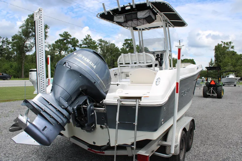 Slide: The Image of 2018 Robalo R200 Center Console boat with Yamaha outboard motor on trailer. - 6