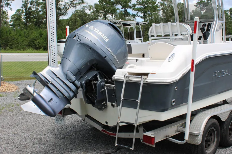 Slide: The Image of 2018 Robalo R200 Center Console boat with Yamaha outboard motor on trailer. - 7