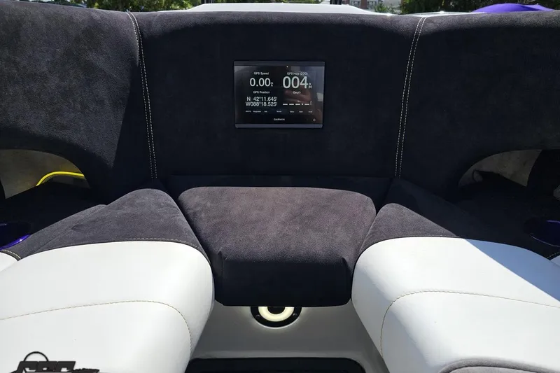 Slide: The Image of Interior of 2008 Nordic Powerboats 35 Flame MCOB with GPS display and cushioned seating. - 101