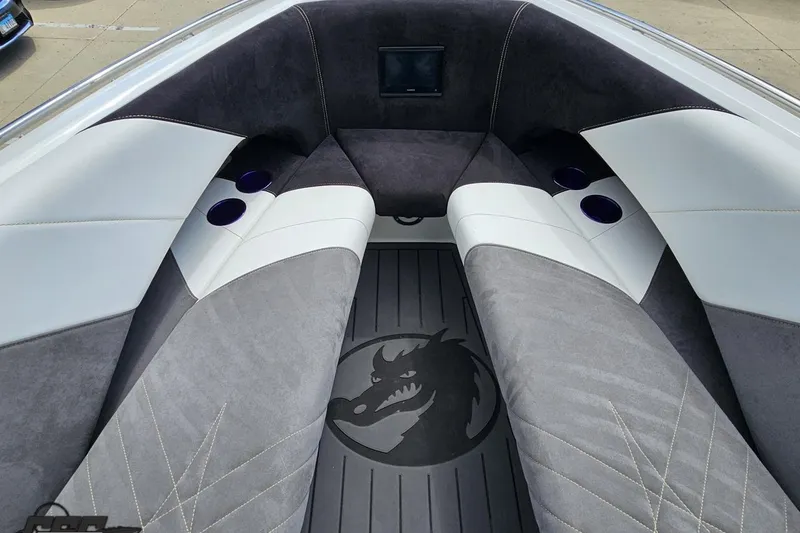 Slide: The Image of 2008 Nordic Powerboats 35 Flame MCOB interior with dragon logo and cup holders. - 102