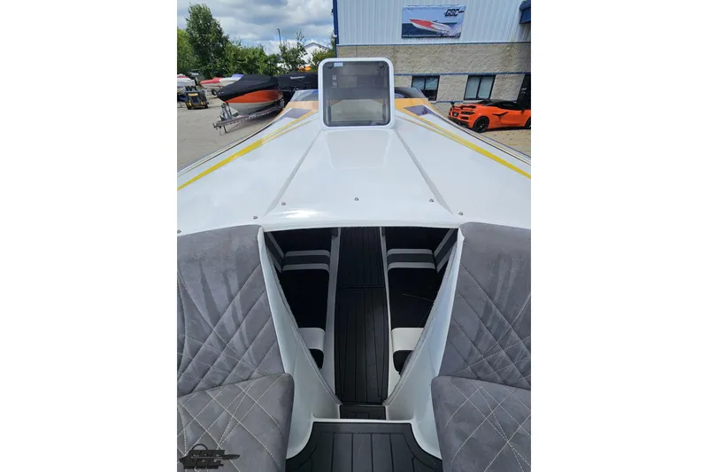 Slide: The Image of 2008 Nordic Powerboats 35 Flame MCOB, sleek design, cockpit view, outdoor setting. - 105