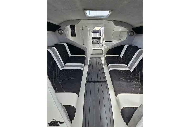 Slide: The Image of 2008 Nordic Powerboats 35 Flame MCOB interior with sleek black and white seating. - 106