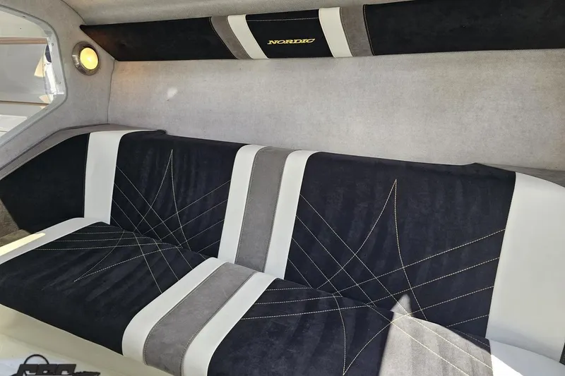 Slide: The Image of Interior of 2008 Nordic Powerboats 35 Flame MCOB with stylish seating and modern design. - 108