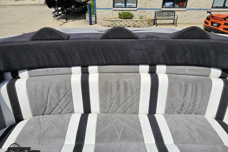 Slide: The Image of 2008 Nordic Powerboats 35 Flame MCOB interior with gray and white striped seating. - 117