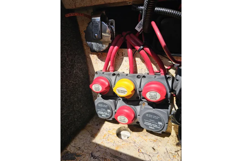 Slide: The Image of Electrical panel with switches and wiring in a 2008 Nordic Powerboats 35 Flame MCOB. - 118