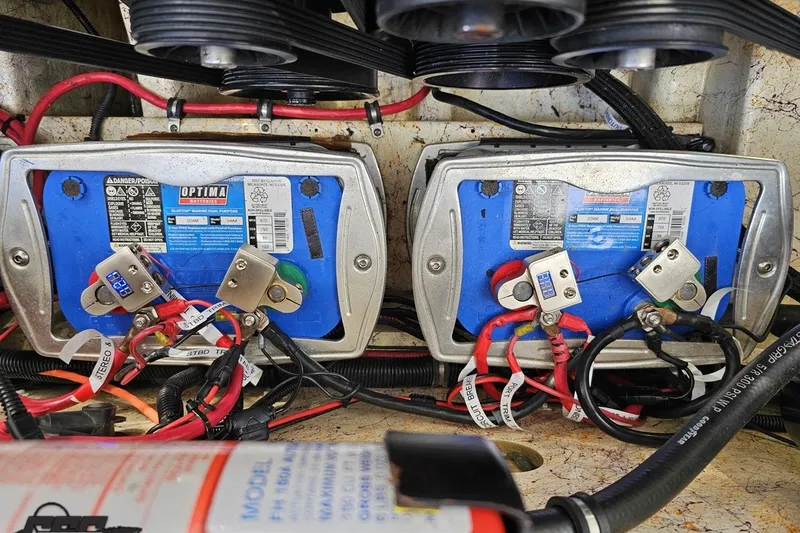 Slide: The Image of Battery setup in 2008 Nordic Powerboats 35 Flame MCOB, featuring Optima batteries and wiring. - 126