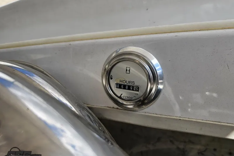 Slide: The Image of Hour meter on 2008 Nordic Powerboats 35 Flame MCOB, displaying 509.6 hours. - 128