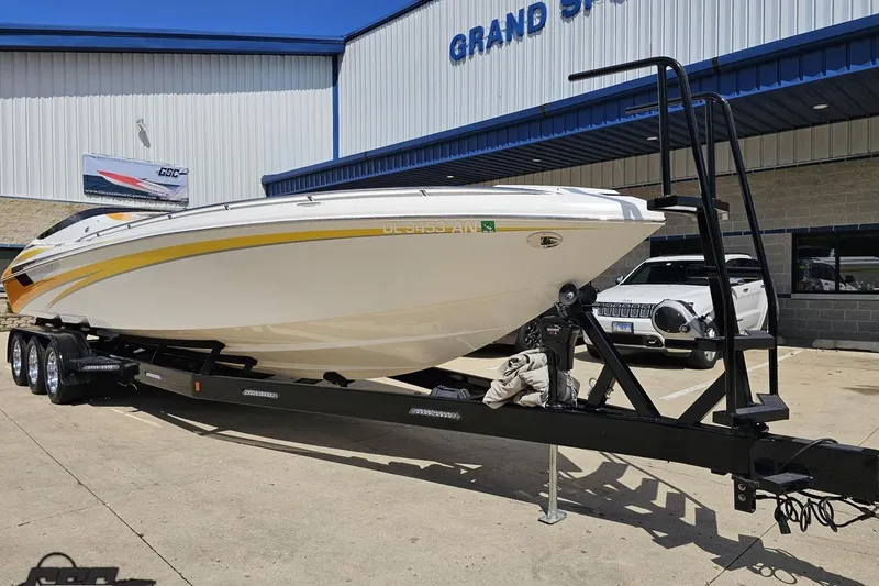 Slide: The Image of 2008 Nordic Powerboats 35 Flame MCOB on trailer outside dealership. - 16