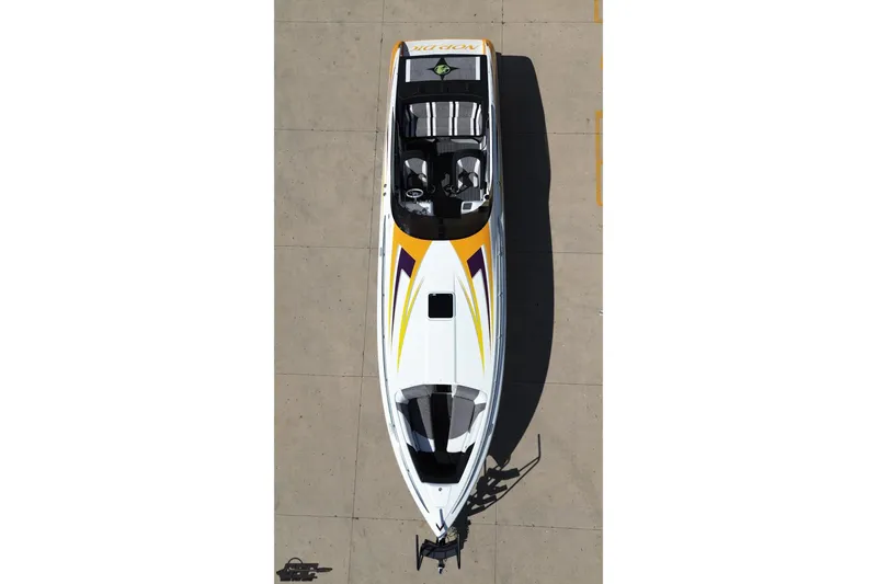 Slide: The Image of 2008 Nordic Powerboats 35 Flame MCOB, aerial view, sleek design with vibrant graphics. - 21