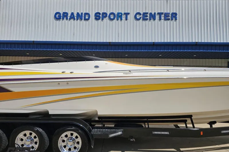 Slide: The Image of 2008 Nordic Powerboats 35 Flame MCOB at Grand Sport Center, featuring sleek design and vibrant colors. - 3