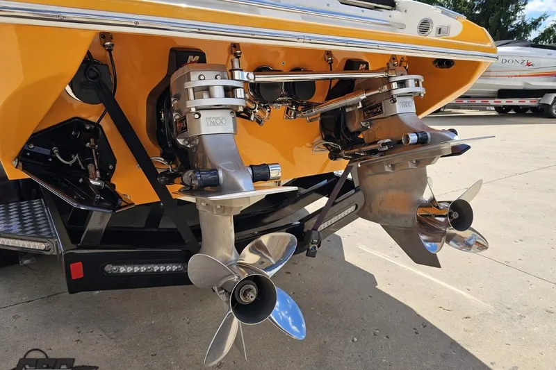 Slide: The Image of Rear view of 2008 Nordic Powerboats 35 Flame MCOB with dual propellers. - 37