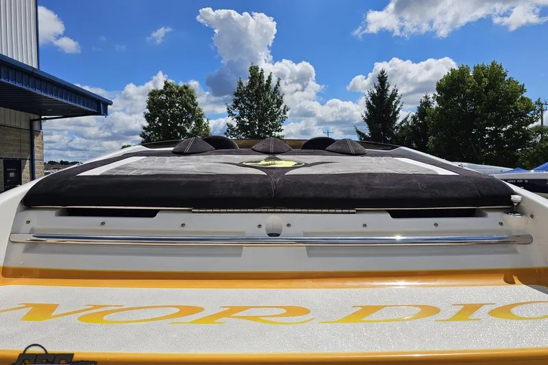 Slide: The Image of 2008 Nordic Powerboats 35 Flame MCOB, rear view under blue sky. - 44