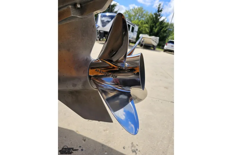 Slide: The Image of Close-up of a shiny propeller on a 2008 Nordic Powerboats 35 Flame MCOB. - 45