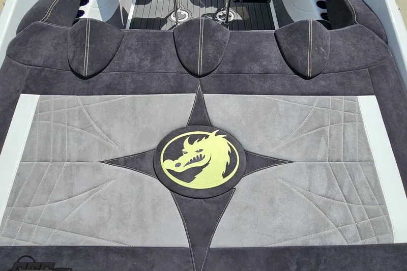 Slide: The Image of 2008 Nordic Powerboats 35 Flame MCOB interior with dragon emblem and stylish upholstery design. - 52