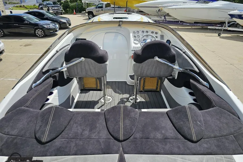 Slide: The Image of 2008 Nordic Powerboats 35 Flame MCOB interior with plush seating and sleek dashboard design. - 54