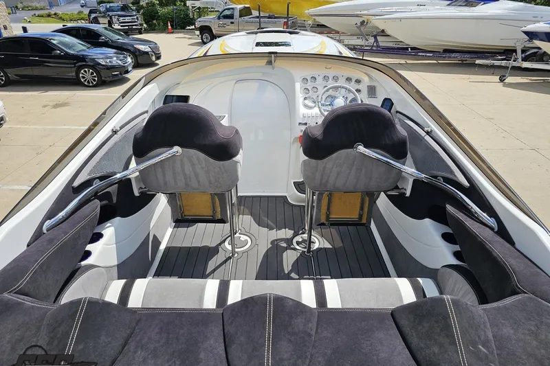 Slide: The Image of 2008 Nordic Powerboats 35 Flame MCOB cockpit with dual seats and sleek dashboard design. - 55