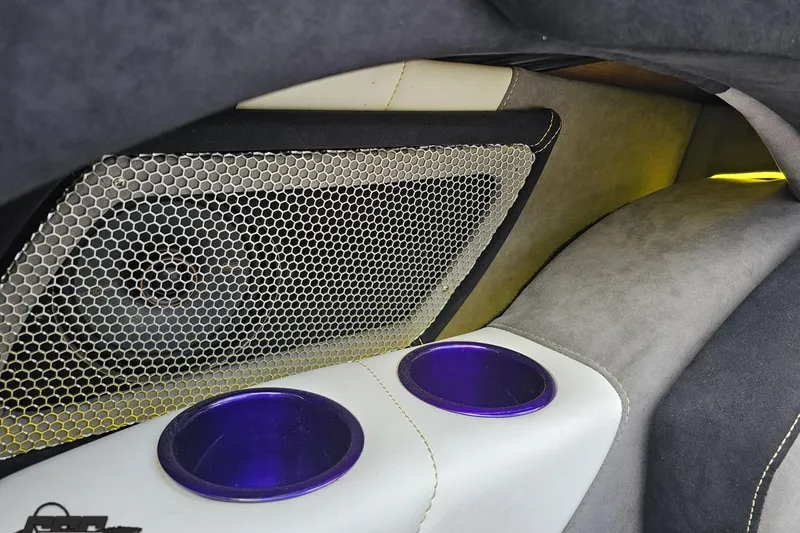 Slide: The Image of Interior of 2008 Nordic Powerboats 35 Flame MCOB with speaker and cup holders. - 62