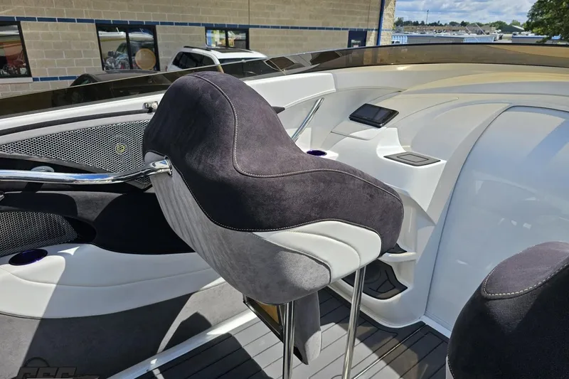 Slide: The Image of 2008 Nordic Powerboats 35 Flame MCOB interior with sleek seating and modern dashboard. - 67