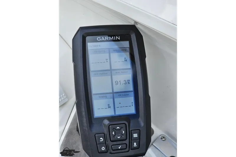 Slide: The Image of Garmin GPS device on 2008 Nordic Powerboats 35 Flame MCOB dashboard. - 78