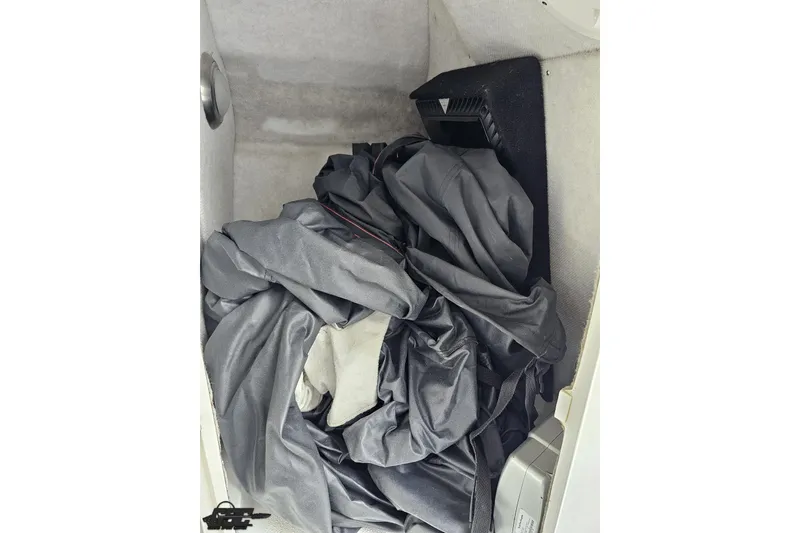 Slide: The Image of 2008 Nordic Powerboats 35 Flame MCOB interior storage with fabric and equipment. - 88