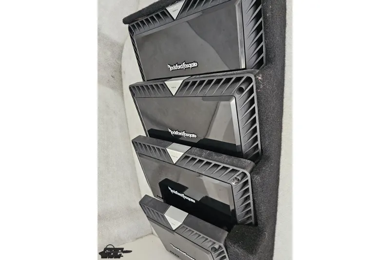 Slide: The Image of Four Rockford Fosgate amplifiers installed in a 2008 Nordic Powerboats 35 Flame MCOB. - 90