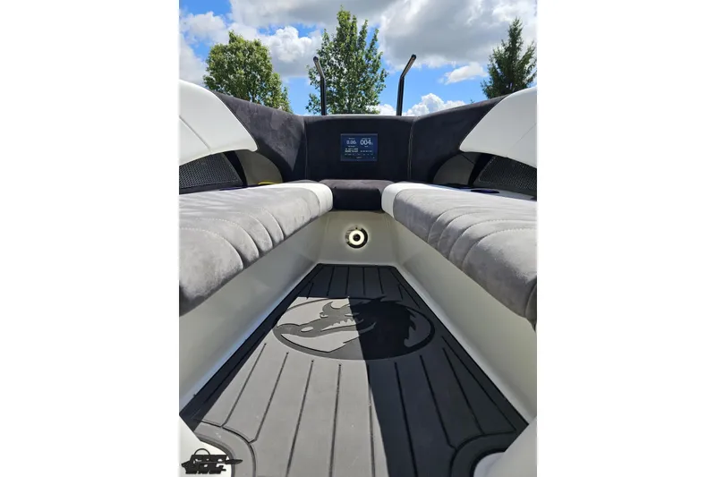 Slide: The Image of 2008 Nordic Powerboats 35 Flame MCOB interior with cushioned seating and sleek design. - 99