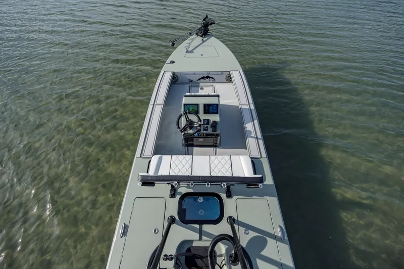 Slide: The Image of Modern Vtech 18 boat, 2025 model, on clear water, featuring advanced navigation controls. - 10