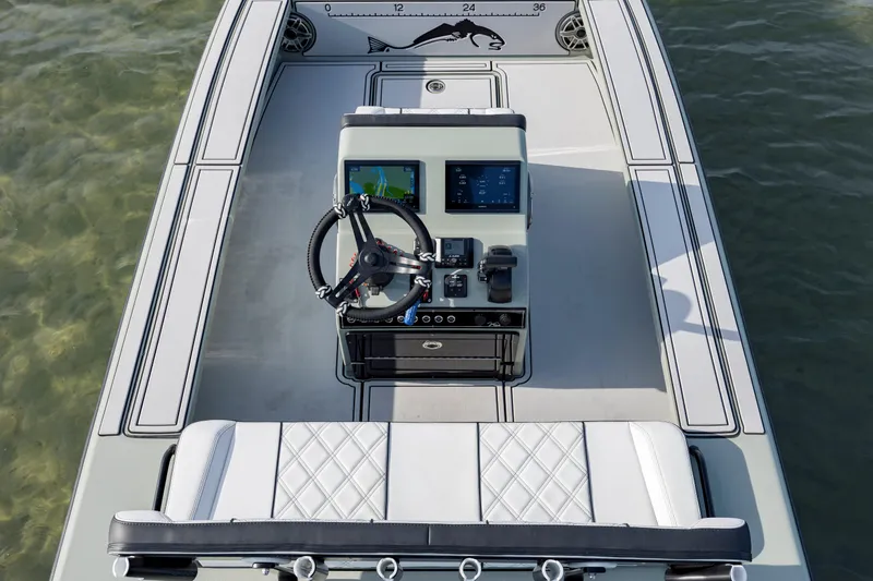 Slide: The Image of Vtech 18 boat dashboard, 2025 model, featuring modern controls and navigation system. - 11