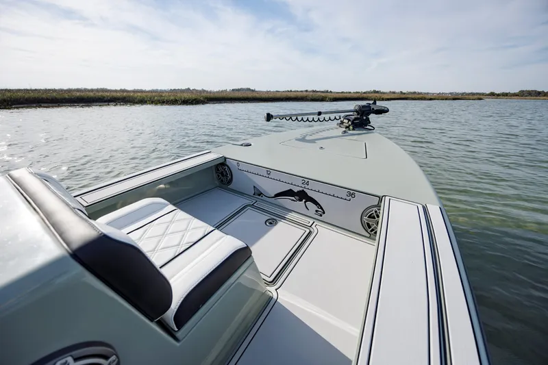 Slide: The Image of Modern Vtech 18 boat on calm water, featuring sleek design and comfortable seating, 2025 model. - 15