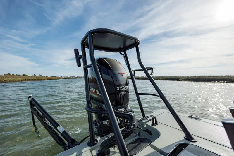 Slide: The Image of Boat with Yamaha 150 engine on water, Vtech model 18, 2025. - 19