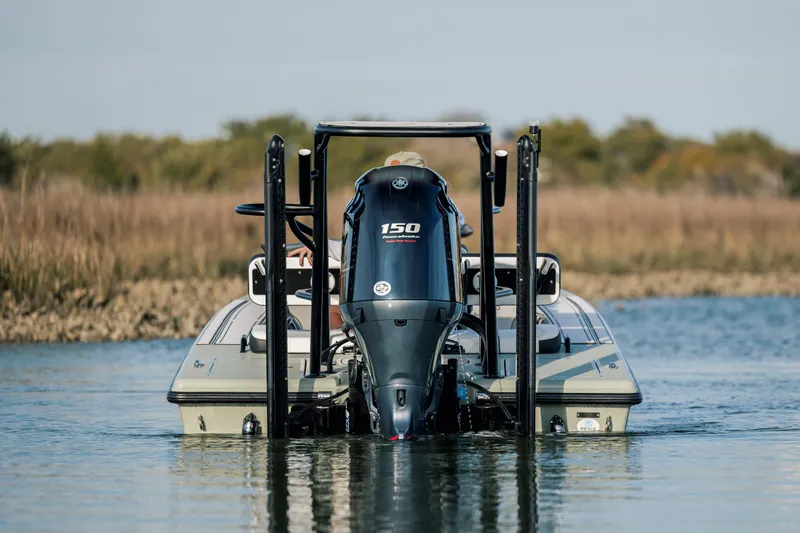 Slide: The Image of Vtech 18 boat with powerful engine on calm water, 2025 model. - 9