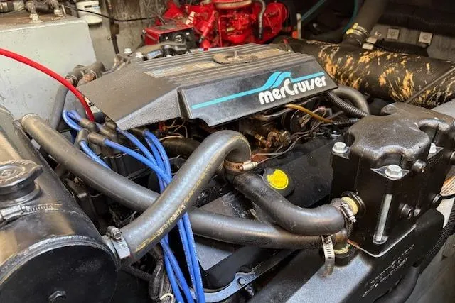 Slide: The Image of Engine of 1995 Sea Ray 370 Sundancer with MerCruiser components, showcasing detailed mechanics. - 16