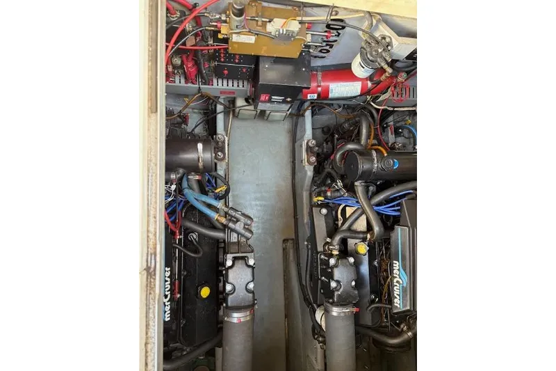 Slide: The Image of Engine compartment of a 1995 Sea Ray 370 Sundancer with MerCruiser components. - 20