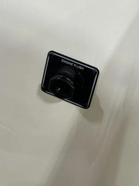 Slide: The Image of 2025 Grady-White Freedom 215 boat docked in a marina. - 1