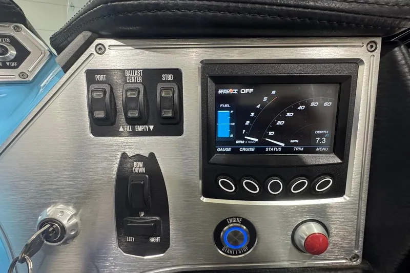 Slide: The Image of 2019 MasterCraft NXT22 dashboard display showing engine metrics and GPS speed control. - 19