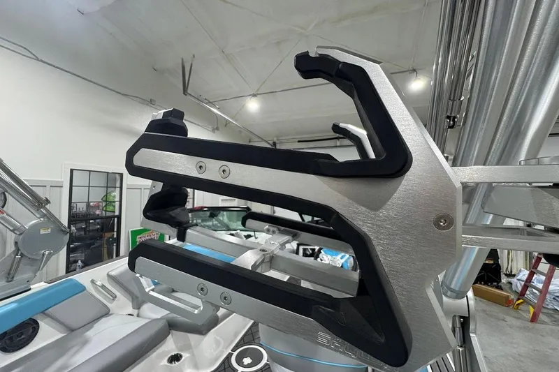 Slide: The Image of 2019 MasterCraft NXT22 boat with Exile Audio speakers in a garage setting. - 24