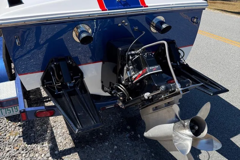 Slide: The Image of Rear view of a 2002 Donzi 22 Classic boat with Mercury Bravo One XR drive. - 10