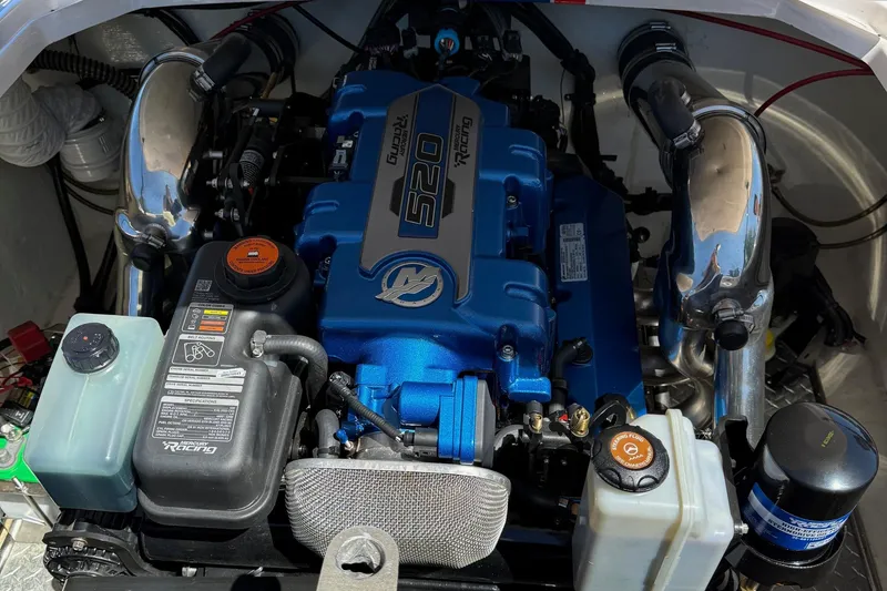 Slide: The Image of Engine of a 2002 Donzi 22 Classic boat, featuring a powerful 520 racing motor. - 4