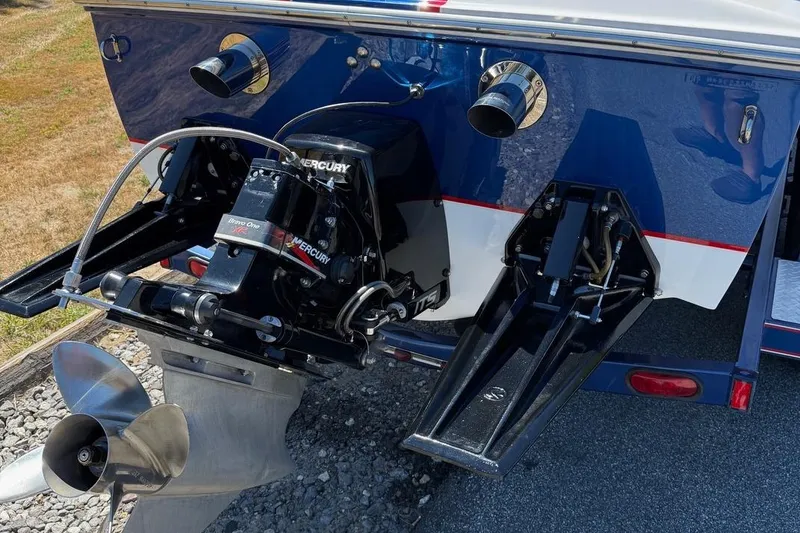 Slide: The Image of Rear view of a 2002 Donzi 22 Classic boat with Mercury Bravo One outdrive. - 9