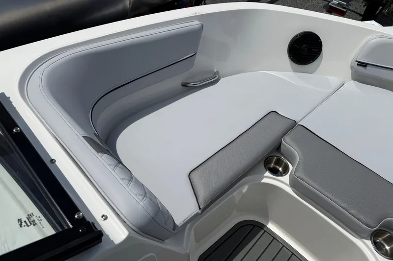 Slide: The Image of 2025 Bayliner VR5 Bowrider I/O interior with sleek seating and modern design. - 12