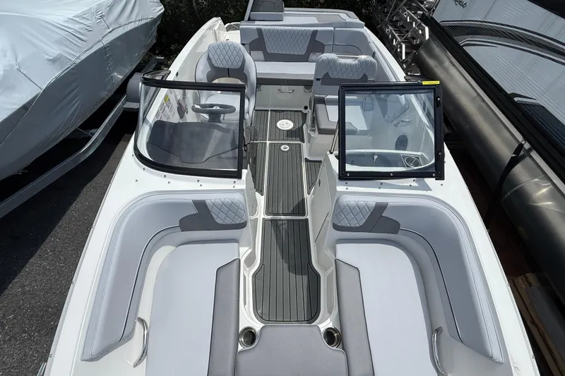 Slide: The Image of 2025 Bayliner VR5 Bowrider I/O with spacious seating and modern design. - 14
