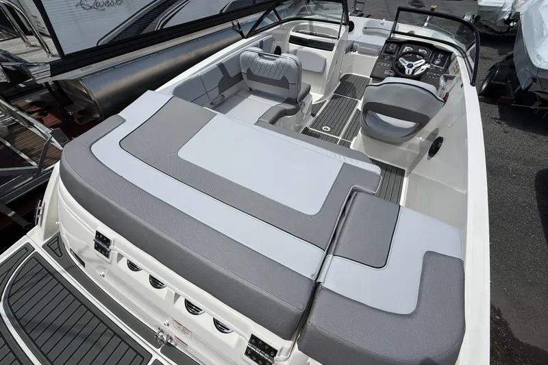 Slide: The Image of 2025 Bayliner VR5 Bowrider I/O interior with sleek seating and modern dashboard design. - 4