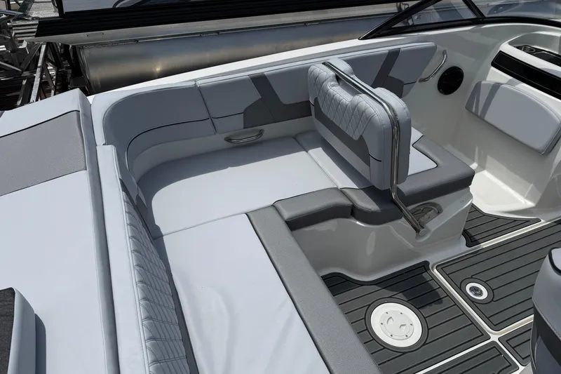 Slide: The Image of 2025 Bayliner VR5 Bowrider I/O interior with sleek seating and modern design. - 7