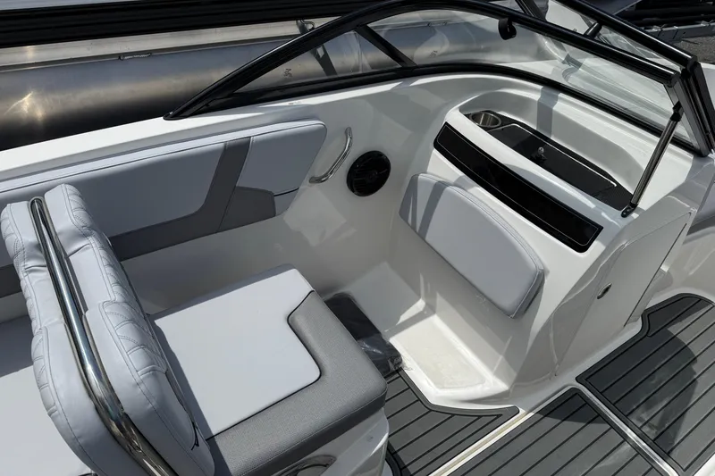 Slide: The Image of 2025 Bayliner VR5 Bowrider I/O interior with sleek seating and modern design. - 8