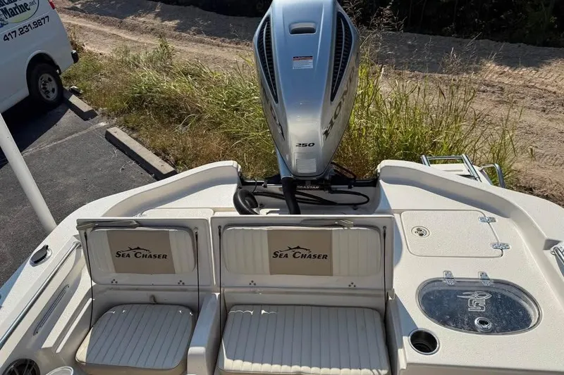 Slide: The Image of 2018 Carolina Skiff 23LX boat with Honda 250 engine, featuring Sea Chaser seating. - 20