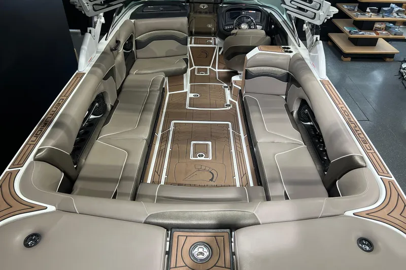 Slide: The Image of 2017 Centurion Ri257 boat interior with luxurious seating and stylish design. - 5