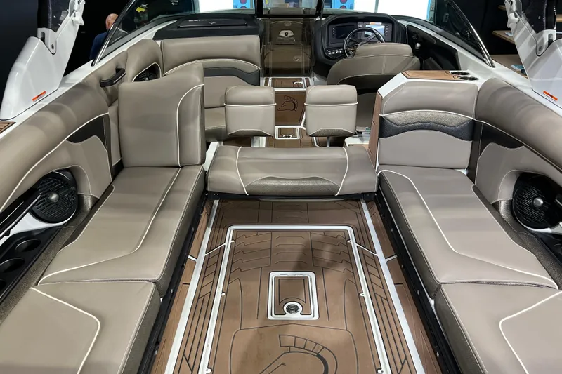 Slide: The Image of 2017 Centurion Ri257 boat interior with luxurious seating and modern dashboard design. - 7